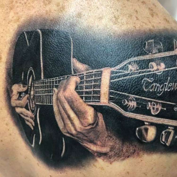 Guitar Player Tattoo image